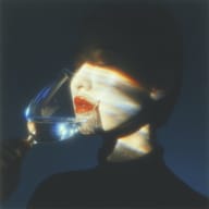 an example of an Surrealistic style image generated in MidJourney using the prompt with the --sref 1430290407, ranked 12th among the user favorites on this website.